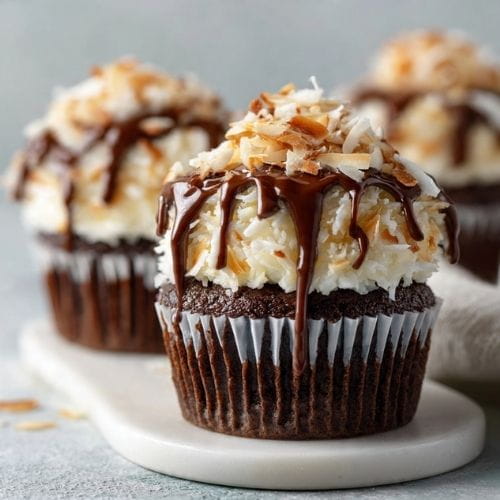 Decadent Almond Joy Cupcakes with Chocolate Drizzle